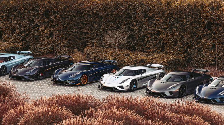 Lineup of Koenigsegg Regera cars, front-left view, parked side-by-side