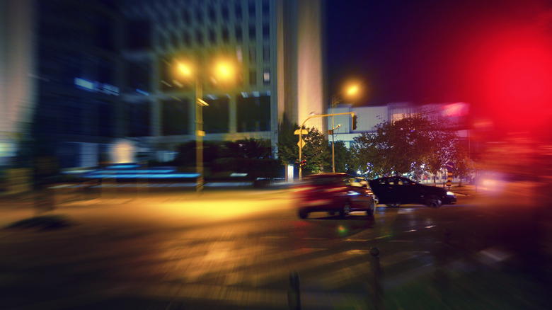 Driver running red light and causing near-collision