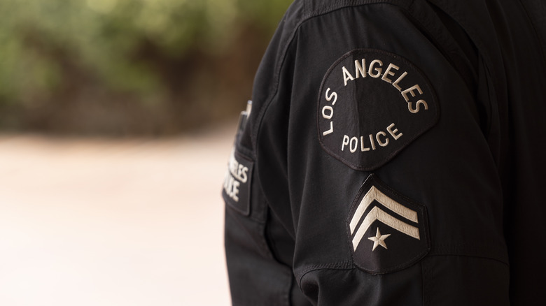 Close-up of Los Angeles Police patch on officer's arm