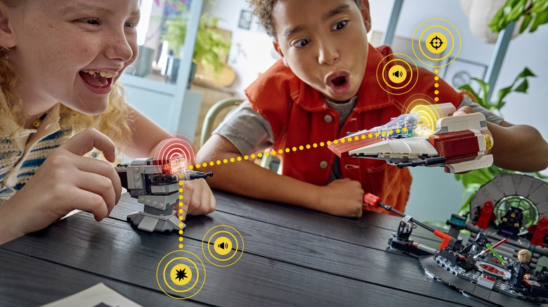 Children playing with LEGO Star Wars AI-powered smart brick tech toys