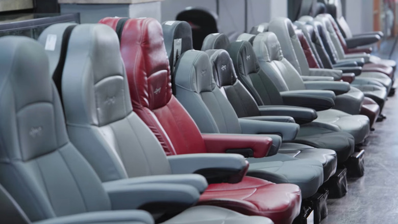 truck aftermarket driver seats arranged in a row at a retailer