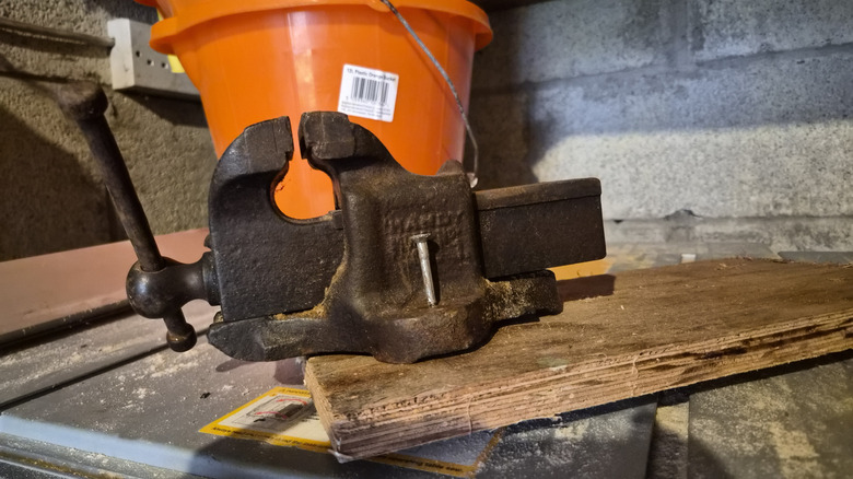 my vise sitting among stuff in a storage shed