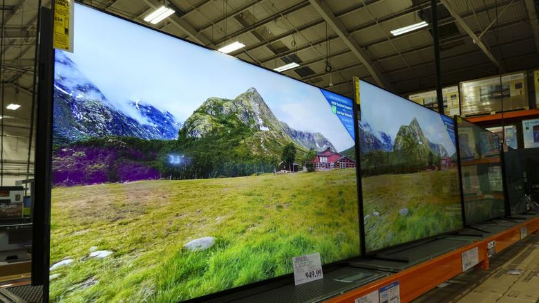 Smart TVs on display at electronics store