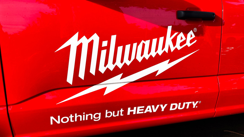 The Milwaukee logo on the side of a vehicle.
