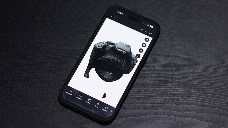 A 3D scan of an SLR camera on Polycam