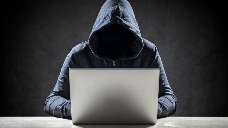 Hacker working on a computer