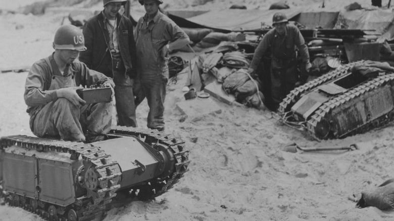 soldier on a goliath tracked mine