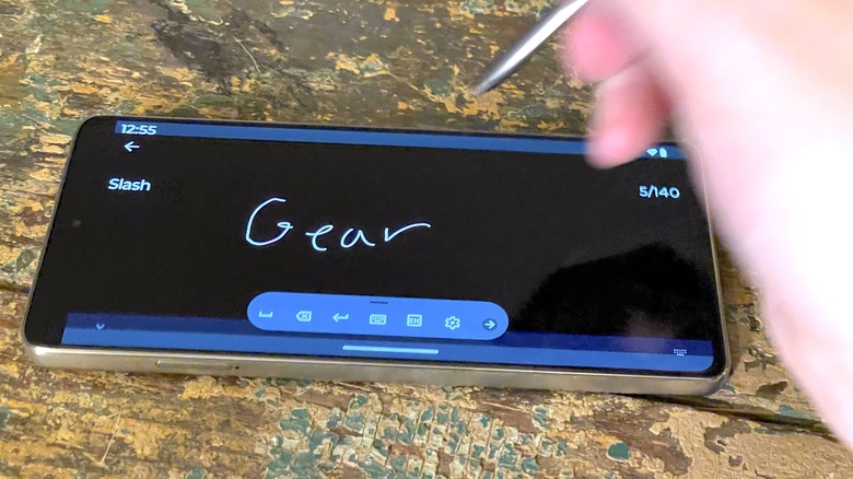 writing "MMtech Online" with the Moto G stylus