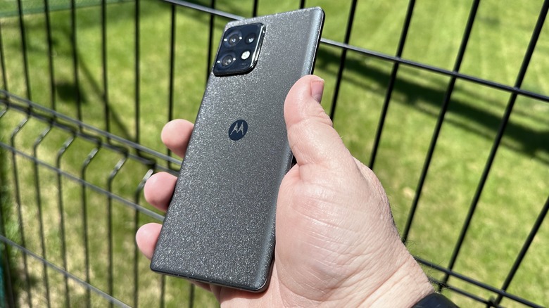 Moto Edge+ held in hand
