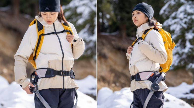 A backpacker traverses snowy mountain terrain with a Hypershell X