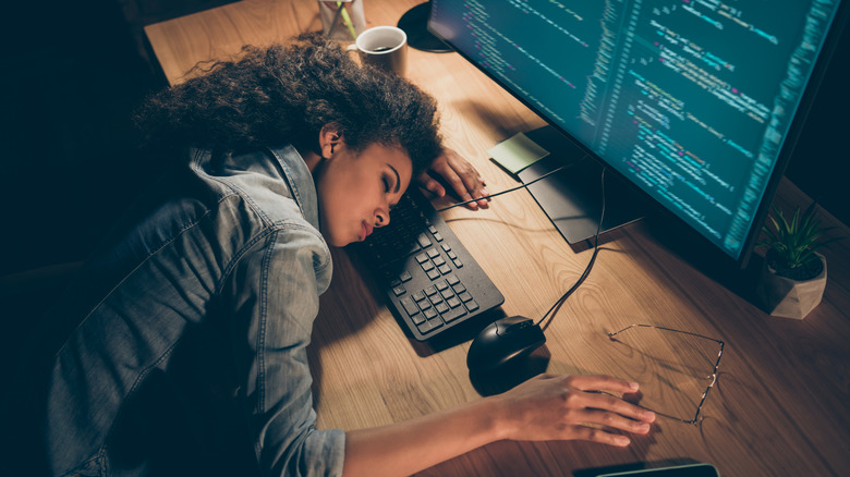 Coder asleep on keyboard