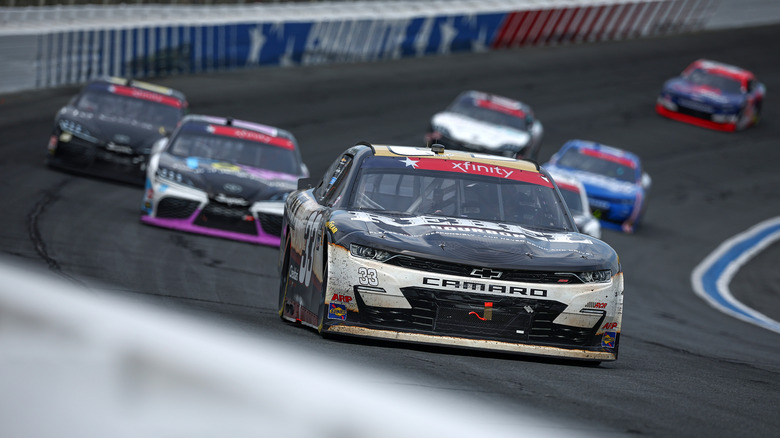Kyle Busch driving Xfinity Series stock car at Charlotte Motor Speedway