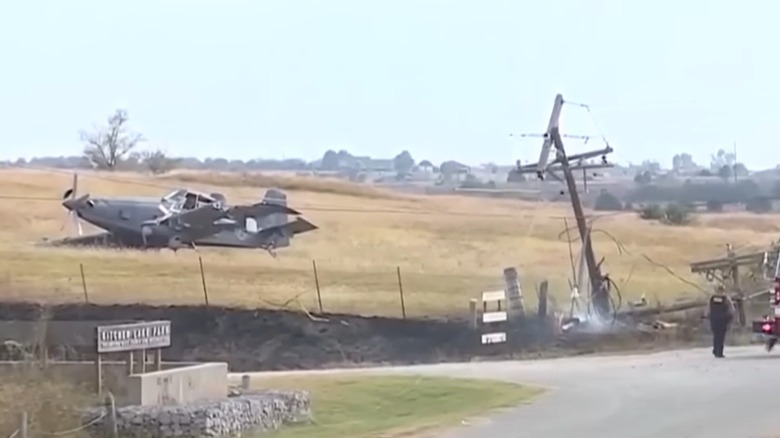 A Skyraider II crashed next to a broken power line.