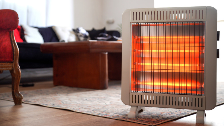 A space heater kept in the living room of a house