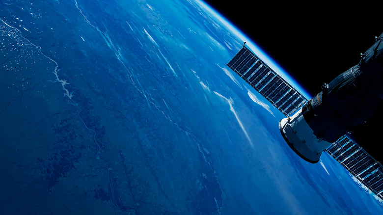 Satellite orbiting Earth.