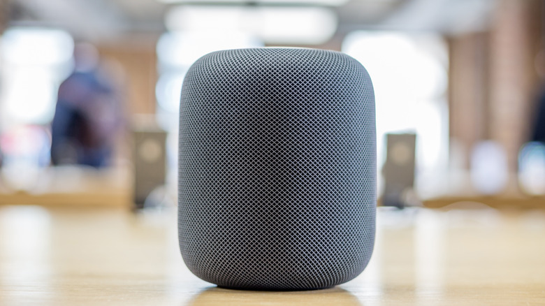 Apple HomePod on polished desk