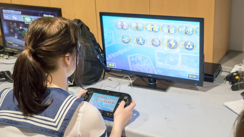 Someone playing Mario Kart 8 on Wii U