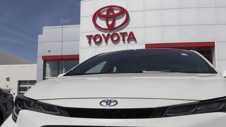 Toyota vehicle in front of dealership