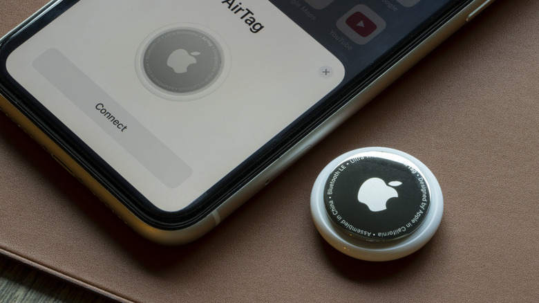 A close up shot of an Apple AirTag