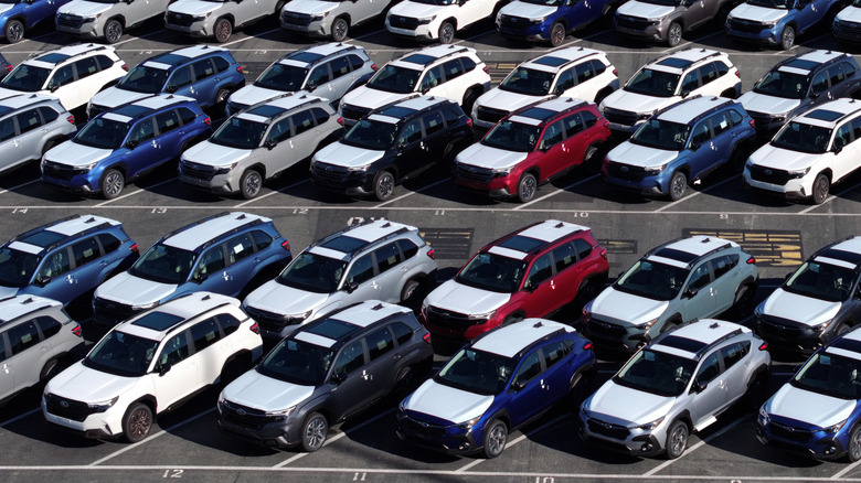 Overhead view of new Subarus parked at shipping port