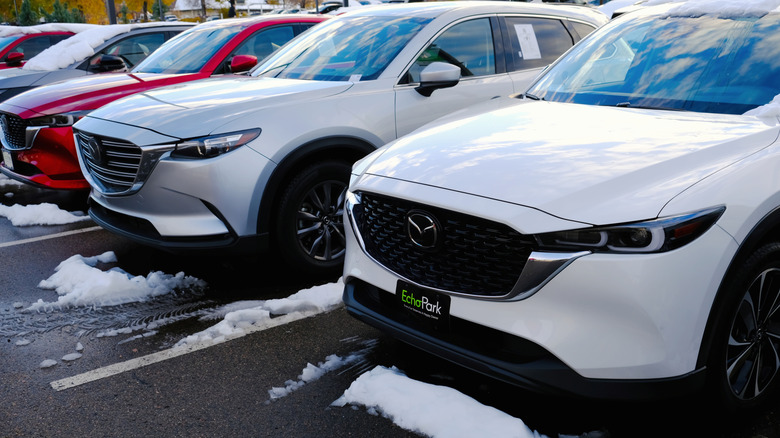 Mazda cars parked at dealership