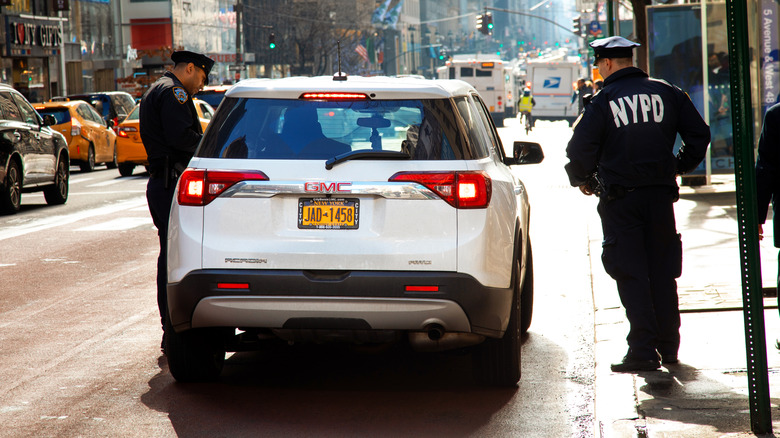police in manhattan ticketing driver
