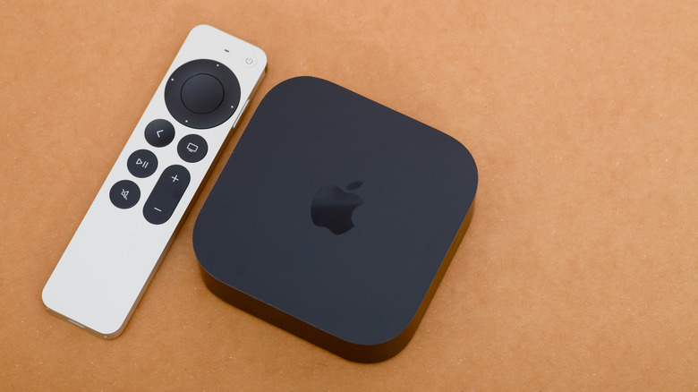 Apple TV and remote side by side, seen from above