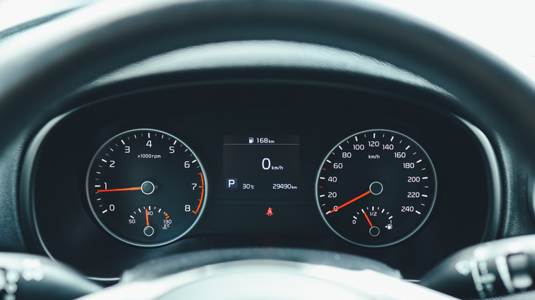 Car dash with odometer showing