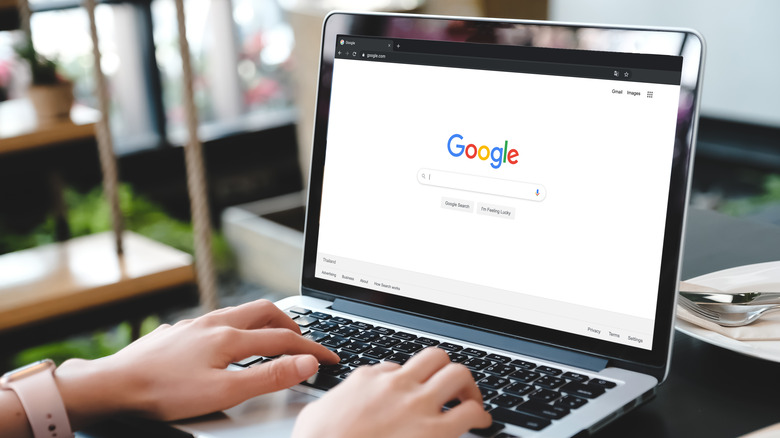 Person using browser laptop