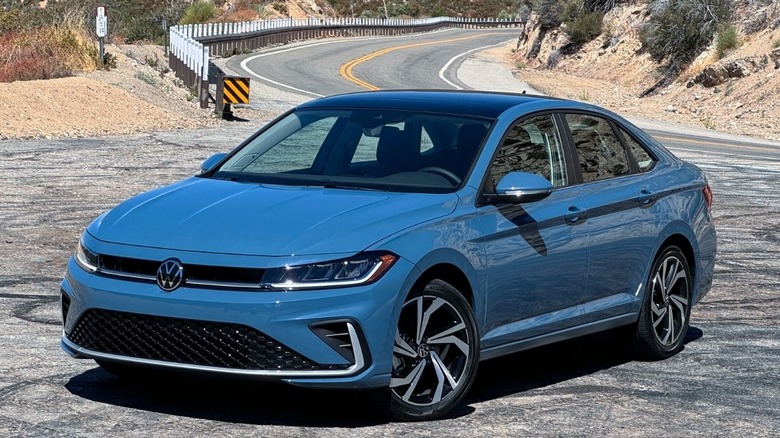 Blue 2025 Volskwagen Jetta parked by roadside