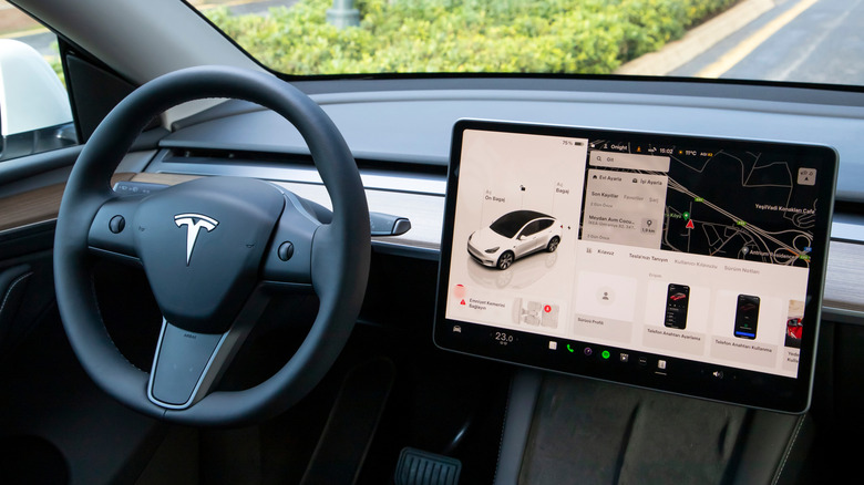 A Tesla interior with no physical buttons.