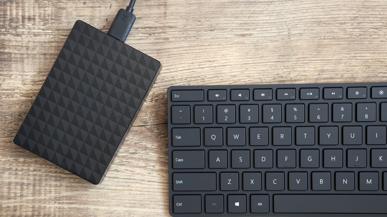 Black external HDD and keyboard