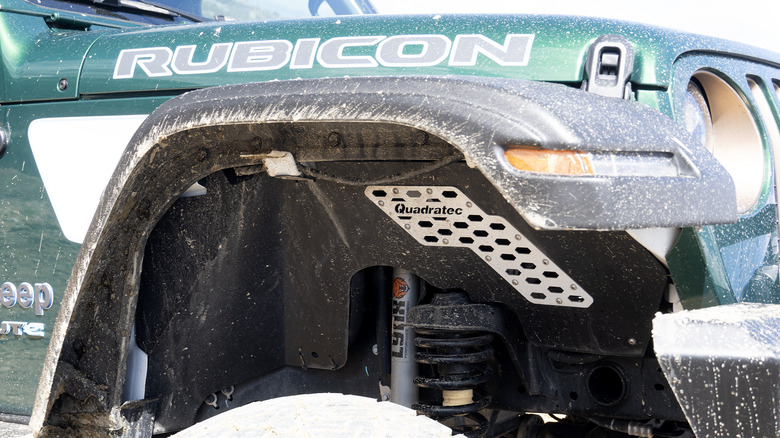 Quadratec JTe wheel well showing suspension and upgrades