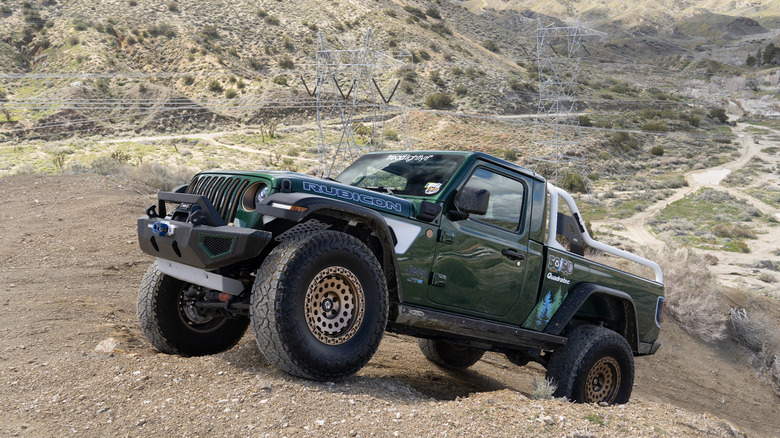 Quadratec JTe posed with power lines