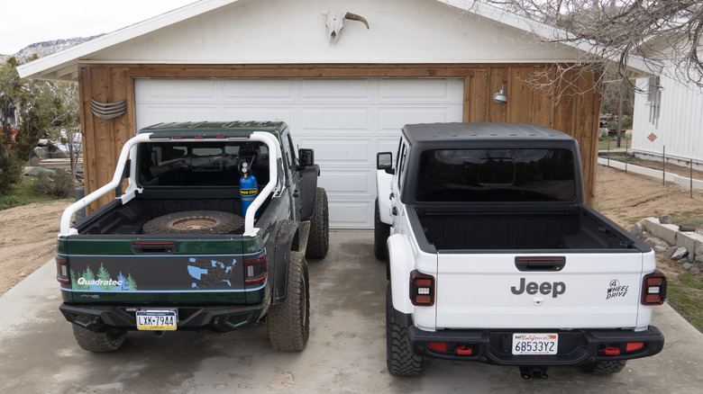 Quadratec JTe parked next to a stock Jeep Gladiator