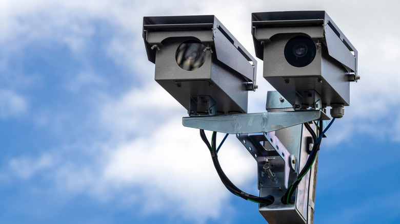 Speed cameras against a blue sky