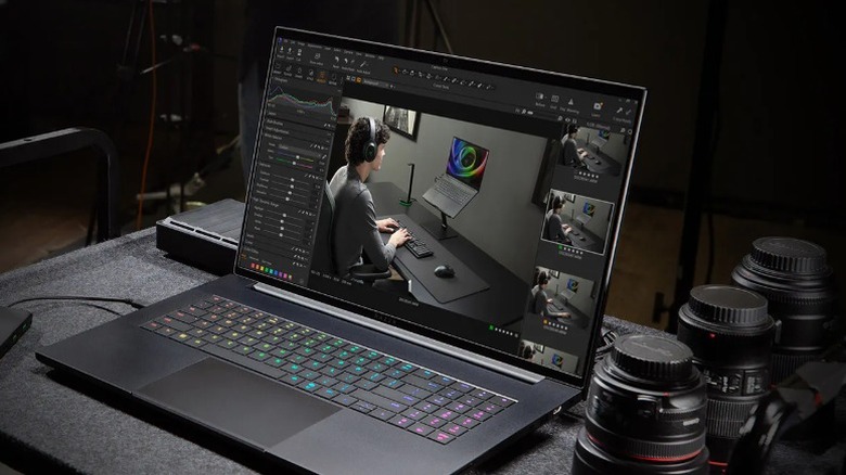 Razer Blade laptop opened, showing digital photo editing software.