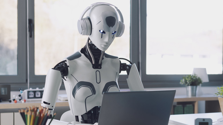 Robot using a laptop