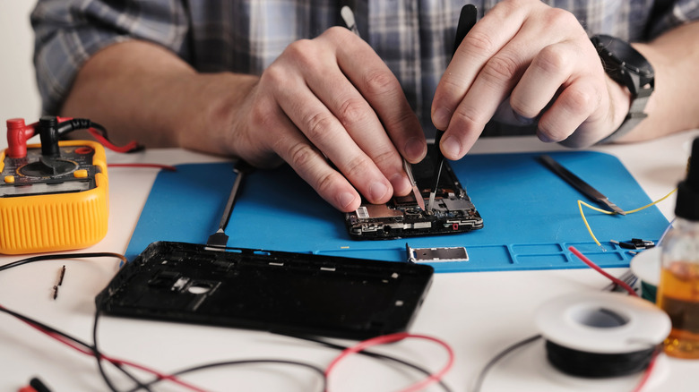 Smartphone being refurbished