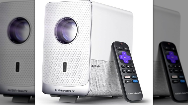 The Aurzen Roku TV Smart Projector D1R Cube smart projector with a remote