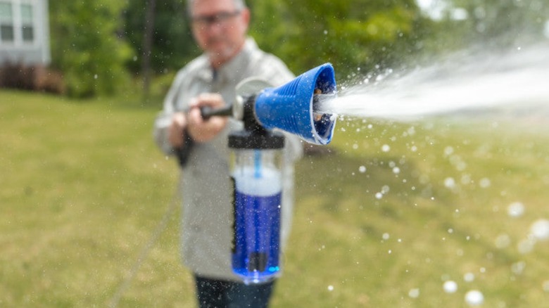 Man using Ryobi Foam Blaster