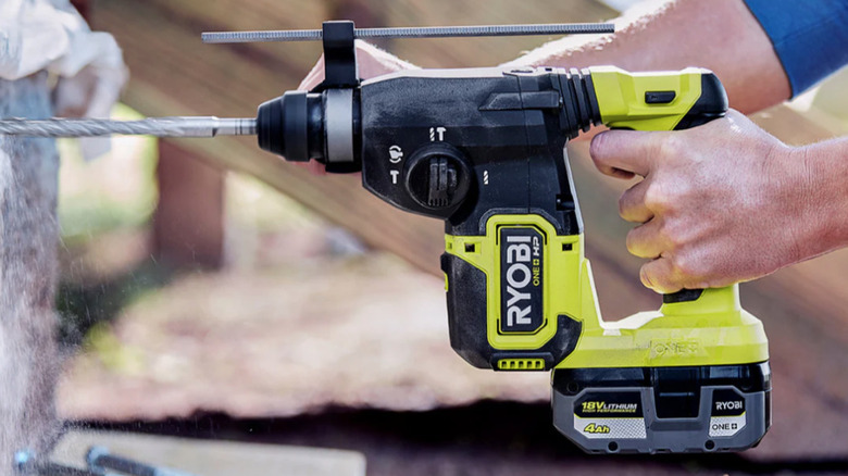 Ryobi drill powered by an 18V ONE+ HP battery