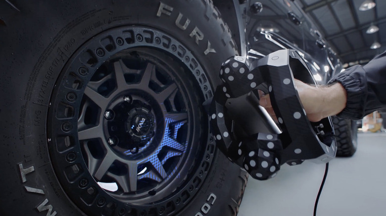 Revopoint Trackit scanning a truck wheel