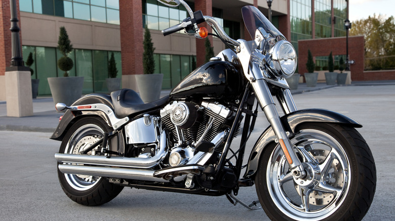 Harley Fat Boy parked outside a complex