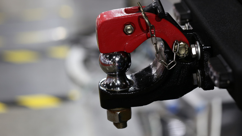 A tow ball trailer hitch on a truck.