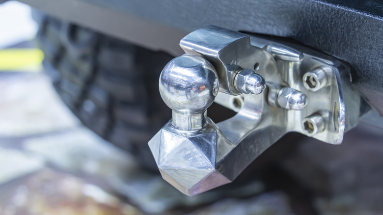A tow ball trailer hitch on a truck.