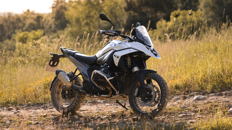 A BMW R1300 GS parked on a trail
