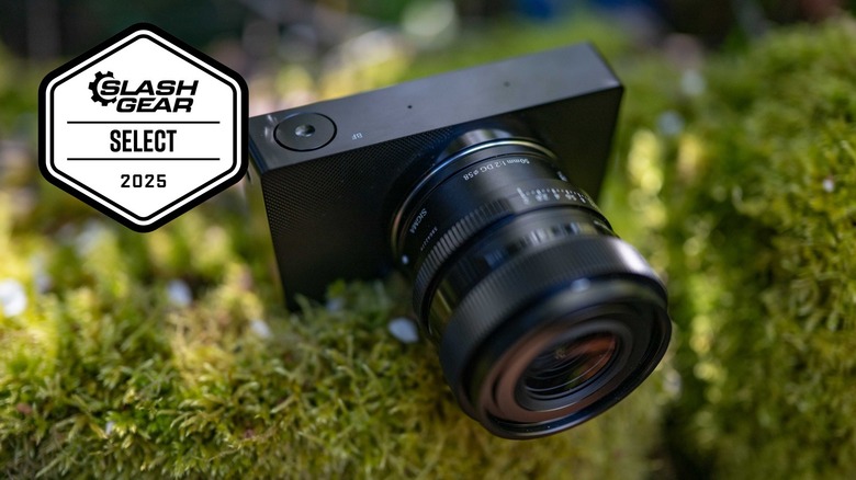 Sigma BF with 50mm f2 lens on top of a moss covered wall.
