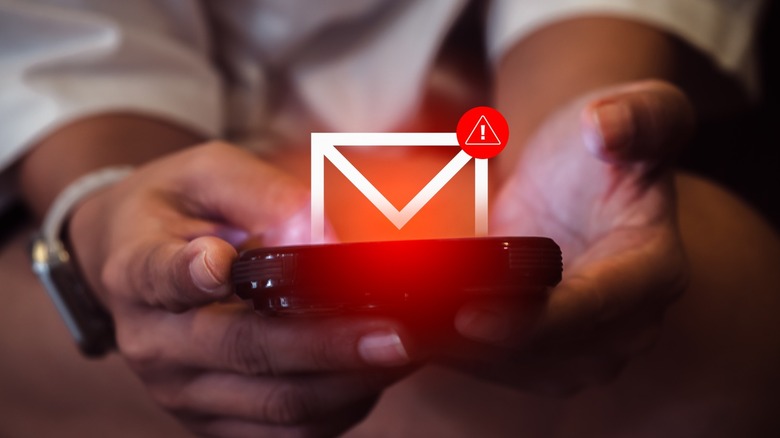 Person viewing an email flagged as suspicious