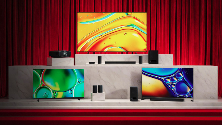 Three different Sony TVs on a platform